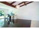 Bright living room with a modern desk and dark wood floors at 2238 Rose St, Sarasota, FL 34239