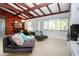 Open living space with beam ceilings, stylish furnishings, and ample natural light at 2238 Rose St, Sarasota, FL 34239