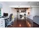 Bright, open floor plan with wood beams, flowing from the office to living room to the kitchen at 2238 Rose St, Sarasota, FL 34239