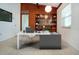 Bright home office with a modern desk, built-in shelves, and stylish décor at 2238 Rose St, Sarasota, FL 34239
