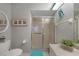 Bright bathroom features a glass enclosed shower, and tile flooring at 245 Coldeway Dr # B10, Punta Gorda, FL 33950