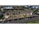 Exterior shot of a condo building offering covered parking and balconies surrounded by verdant landscaping at 245 Coldeway Dr # B10, Punta Gorda, FL 33950
