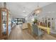 Bright living room with open floor plan, dining area, and nautical decor at 245 Coldeway Dr # B10, Punta Gorda, FL 33950