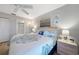 Cozy main bedroom featuring a plush bed, ample natural light, and soothing decor for a relaxing retreat at 245 Coldeway Dr # B10, Punta Gorda, FL 33950