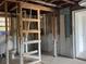 Bathroom interior with exposed framing and basic plumbing fixtures, awaiting transformation at 29 Michiana Dr, Terra Ceia, FL 34250