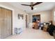 Room featuring a ceiling fan, a closet, storage and decor at 2922 Williamsburg St, Sarasota, FL 34231