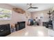 Room featuring two windows, a ceiling fan, storage and decor at 2922 Williamsburg St, Sarasota, FL 34231