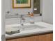 Modern bathroom featuring a sleek countertop, contemporary fixtures, and stylish design at 301 Quay Commons # 1610, Sarasota, FL 34236