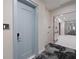 Hallway features door number 507 and long hallway with an exit sign in the distance at 301 Quay Commons # 507, Sarasota, FL 34236