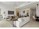 Spacious living room with modern decor, a stylish chandelier, and a seamless open floor plan at 301 Quay Commons # 507, Sarasota, FL 34236