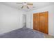 This bedroom features natural light, a closet, and access to another room at 309 Glen Oak Rd, Venice, FL 34293