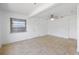 Bonus room with tile floors and a ceiling fan, offering versatile space at 309 Glen Oak Rd, Venice, FL 34293