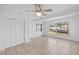 Bonus room with tile flooring, closet, and a window with a view to the backyard at 309 Glen Oak Rd, Venice, FL 34293