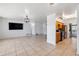 Expansive living area with open layout, seamlessly connecting to the kitchen and dining space at 309 Glen Oak Rd, Venice, FL 34293