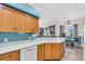 Well-lit kitchen with white countertops and wood cabinetry at 3514 92Nd E Ave, Parrish, FL 34219