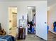 View of the bedroom with a door to the walk-in closet and bathroom at 3606 Beneva Rd # 506, Sarasota, FL 34232