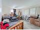 Bright bedroom with laminate floors and large windows at 3606 Beneva Rd # 506, Sarasota, FL 34232