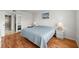 Bedroom featuring a bright interior and access to an attached bathroom at 4325 46Th W Ave # 104, Bradenton, FL 34210