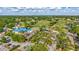 Aerial view of a golf course community with lush green fairways, ponds, and manicured landscaping at 4487 Glebe Farm Rd, Sarasota, FL 34235