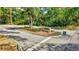 Community entrance with lush landscaping and signage, offering a welcoming first impression at 4487 Glebe Farm Rd, Sarasota, FL 34235