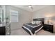 A stylish bedroom features modern decor and a comfortable bed, creating a relaxing retreat at 4725 Antrim Dr, Sarasota, FL 34240