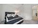 A cozy bedroom with a comfortable bed and a view of the closet, perfect for relaxation at 4725 Antrim Dr, Sarasota, FL 34240