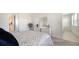 Serene bedroom with a dresser, plush carpet, and access to the bathroom at 4725 Antrim Dr, Sarasota, FL 34240