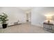 Clean bedroom with plant, lamp, table and light-colored floors, creating a serene and inviting ambiance at 4725 Antrim Dr, Sarasota, FL 34240