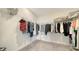 Organized walk-in closet with ample shelving and hanging space for clothes and accessories at 4725 Antrim Dr, Sarasota, FL 34240