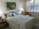 Comfortable bedroom with bright natural light from the window at 5320 Hyland Hills Ave # 2214, Sarasota, FL 34241