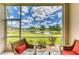 Enjoy the outdoors from this screened lanai with a picturesque view of the pond and community landscape at 5320 Hyland Hills Ave # 2214, Sarasota, FL 34241