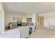 Bright living room featuring neutral furniture, large windows, and a comfortable setting at 5320 Hyland Hills Ave # 2214, Sarasota, FL 34241