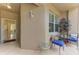 Inviting outdoor seating area with comfortable chairs and a side table at 5320 Hyland Hills Ave # 2214, Sarasota, FL 34241