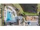 Aerial view of the community pool, playground, and scenic pond, creating a vibrant recreational space at 5426 Rainwood Meadows Dr, Apollo Beach, FL 33572