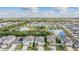 Desirable neighborhood with water views surrounding homes in a lush, green landscape at 5426 Rainwood Meadows Dr, Apollo Beach, FL 33572