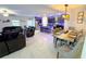 Open-concept living and dining area with modern furnishings and ample space at 5426 Rainwood Meadows Dr, Apollo Beach, FL 33572