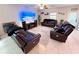Comfortable living room with a large television and plenty of seating at 5426 Rainwood Meadows Dr, Apollo Beach, FL 33572