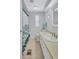 Cozy bathroom featuring a neutral vanity and a bathtub with a curtain at 5619 Bayshore Rd # 211, Palmetto, FL 34221