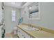 Cozy bathroom featuring a neutral vanity and a bathtub with a curtain at 5619 Bayshore Rd # 211, Palmetto, FL 34221