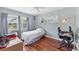 Bedroom features hardwood floors and natural light at 5675 Saint Louis Ave, Sarasota, FL 34233