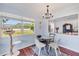 Cozy dining area adjacent to the kitchen with natural light at 5675 Saint Louis Ave, Sarasota, FL 34233