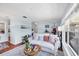 Comfortable living room with hardwood floors and ample natural light at 5675 Saint Louis Ave, Sarasota, FL 34233