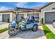 Golf cart parked in the driveway of the home at 5694 Palmer Cir # 202, Bradenton, FL 34211