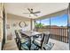 Well-appointed lanai featuring a dining table and a serene outdoor view at 5694 Palmer Cir # 202, Bradenton, FL 34211