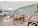 Bright, open living area flows seamlessly from kitchen with access to outdoor patio at 5694 Palmer Cir # 202, Bradenton, FL 34211