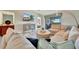 Inviting living room featuring a comfortable seating area with golf course view at 5694 Palmer Cir # 202, Bradenton, FL 34211