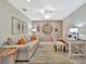 Cozy home office featuring a comfortable sofa, desk area and stylish decor at 5694 Palmer Cir # 202, Bradenton, FL 34211