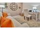 Bright home office space with a comfortable seating area and functional desk setup at 5694 Palmer Cir # 202, Bradenton, FL 34211