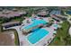 An aerial view shows off the community pool, patio, and other luxury amenities at 5694 Palmer Cir # 202, Bradenton, FL 34211