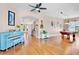 Spacious living room with hardwood floors, decorative piano and room for entertaining at 6311 Sturbridge Ct, Sarasota, FL 34238